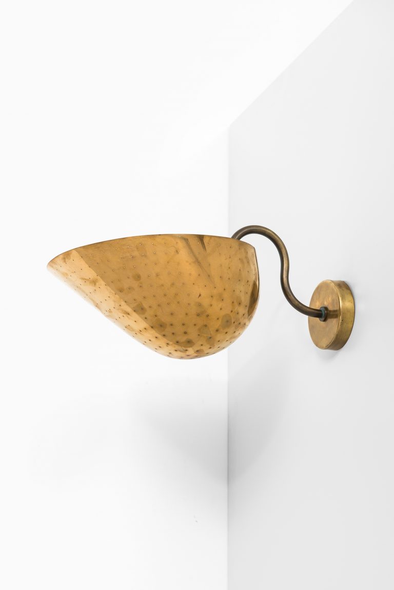 Carl-Axel Acking wall lamps in brass at Studio Schalling
