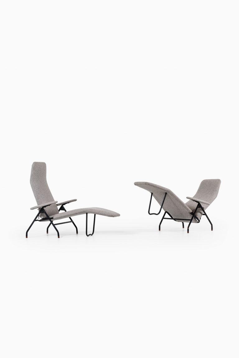 A pair of reclining chairs in black steel at Studio Schalling