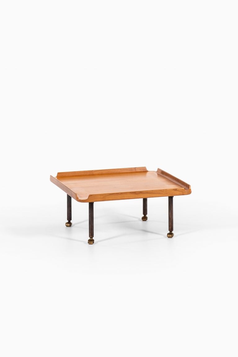 Finn Juhl side table in cherry and brass at Studio Schalling