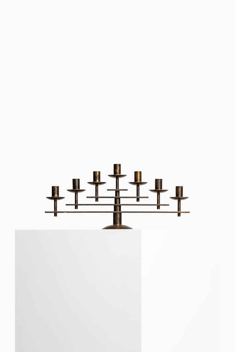 Heavy candlestick in brass from Denmark at Studio Schalling