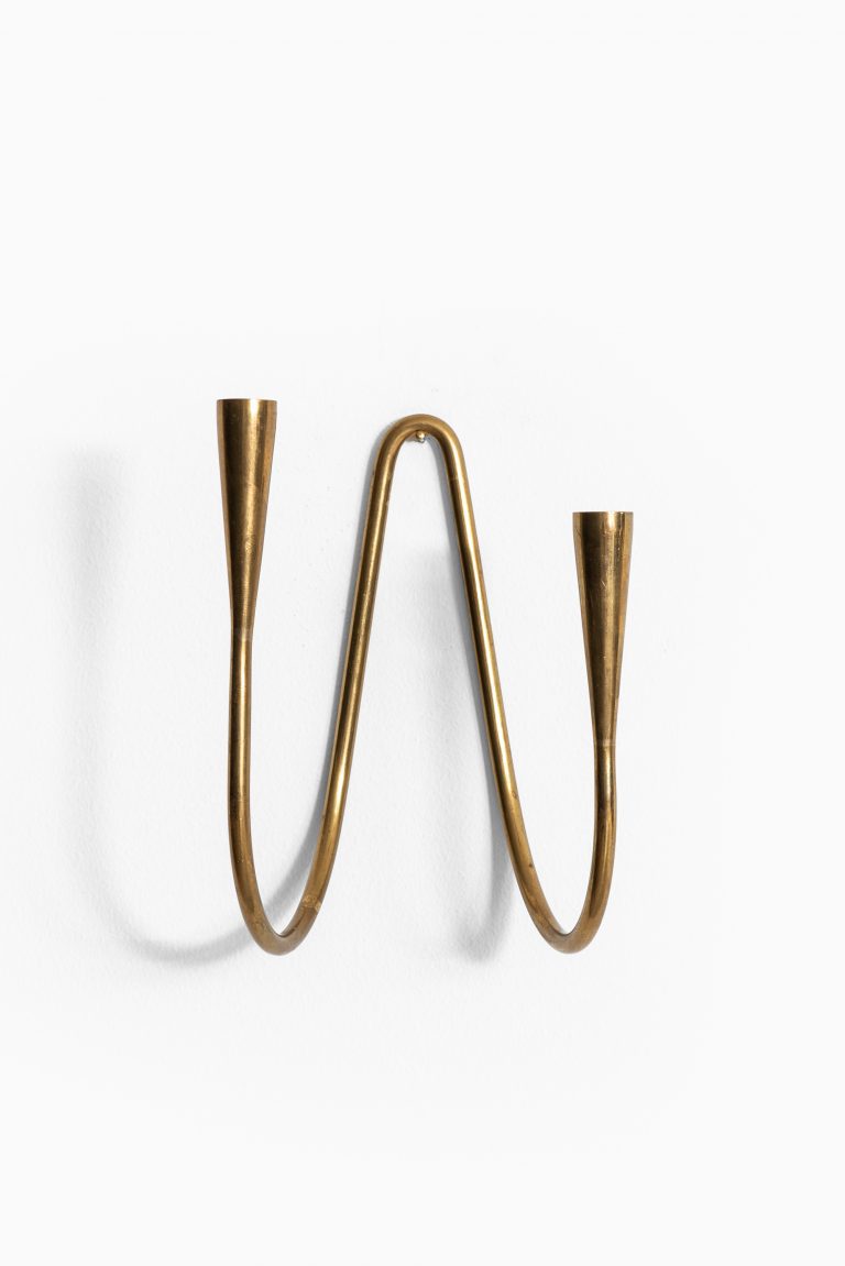 Carl Auböck wall hanged candlestick in brass at Studio Schalling