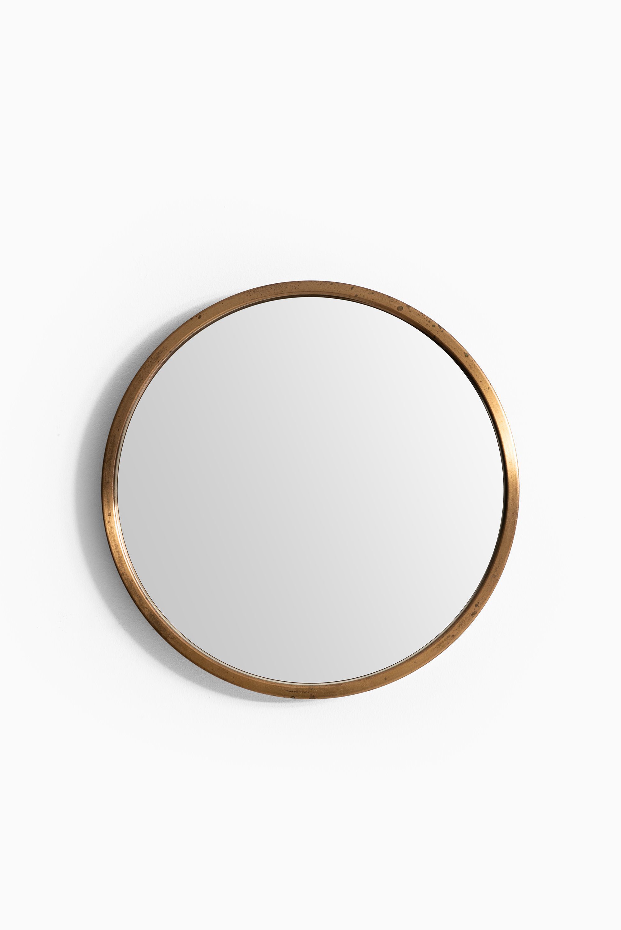 Glasmäster mirror nr 131 in brass at Studio Schalling
