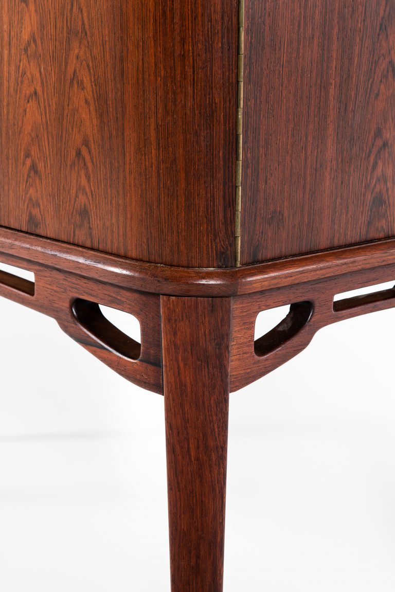 Rosewood cabinet with brass details at Studio Schalling