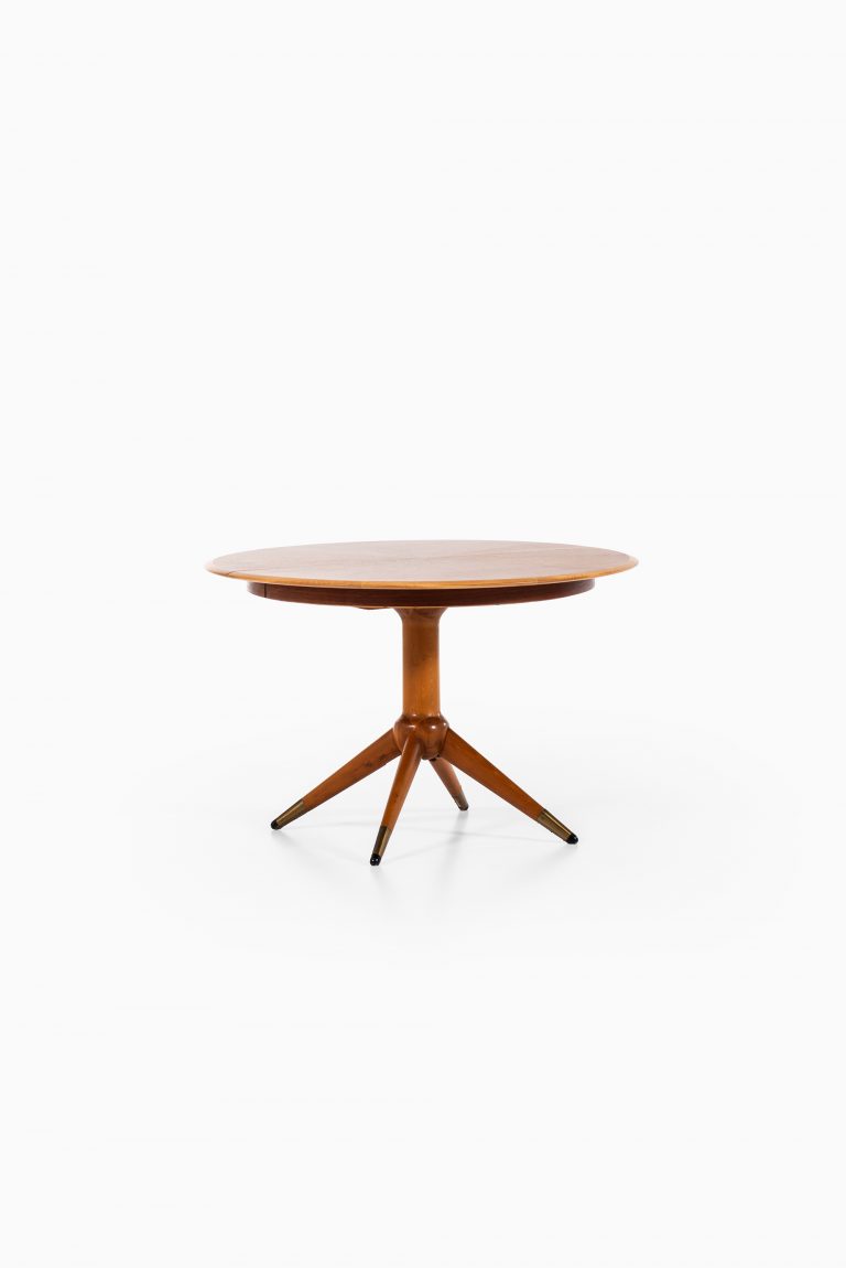 David Rosén dining table in teak and brass at Studio Schalling