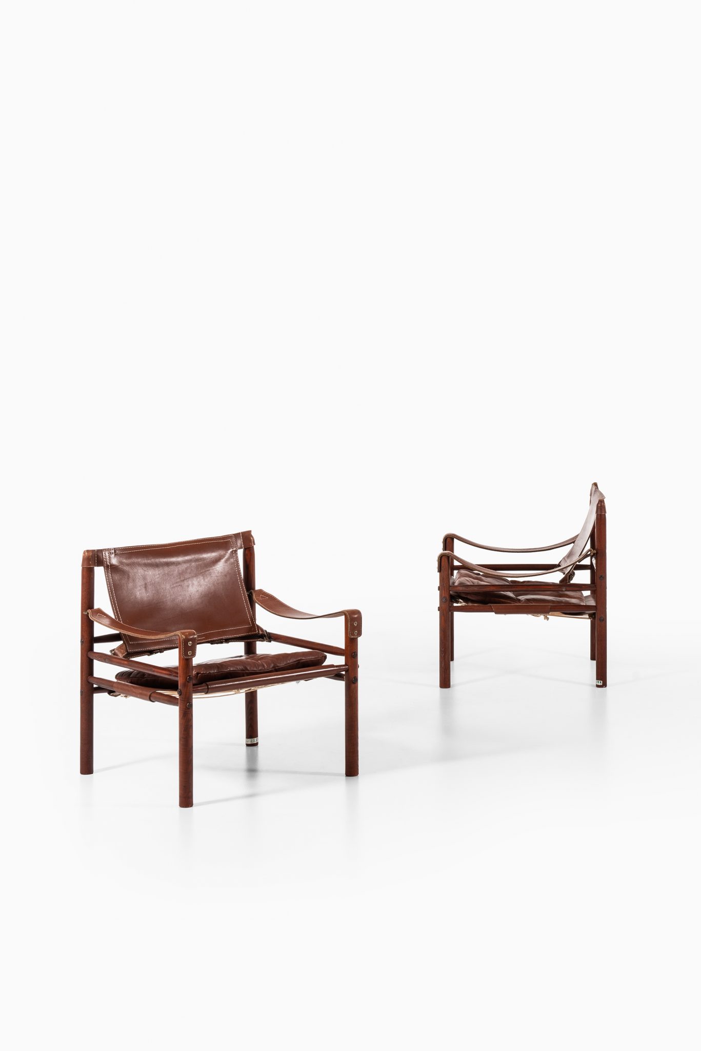 Arne Norell Sirocco easy chairs in brown leather at Studio Schalling