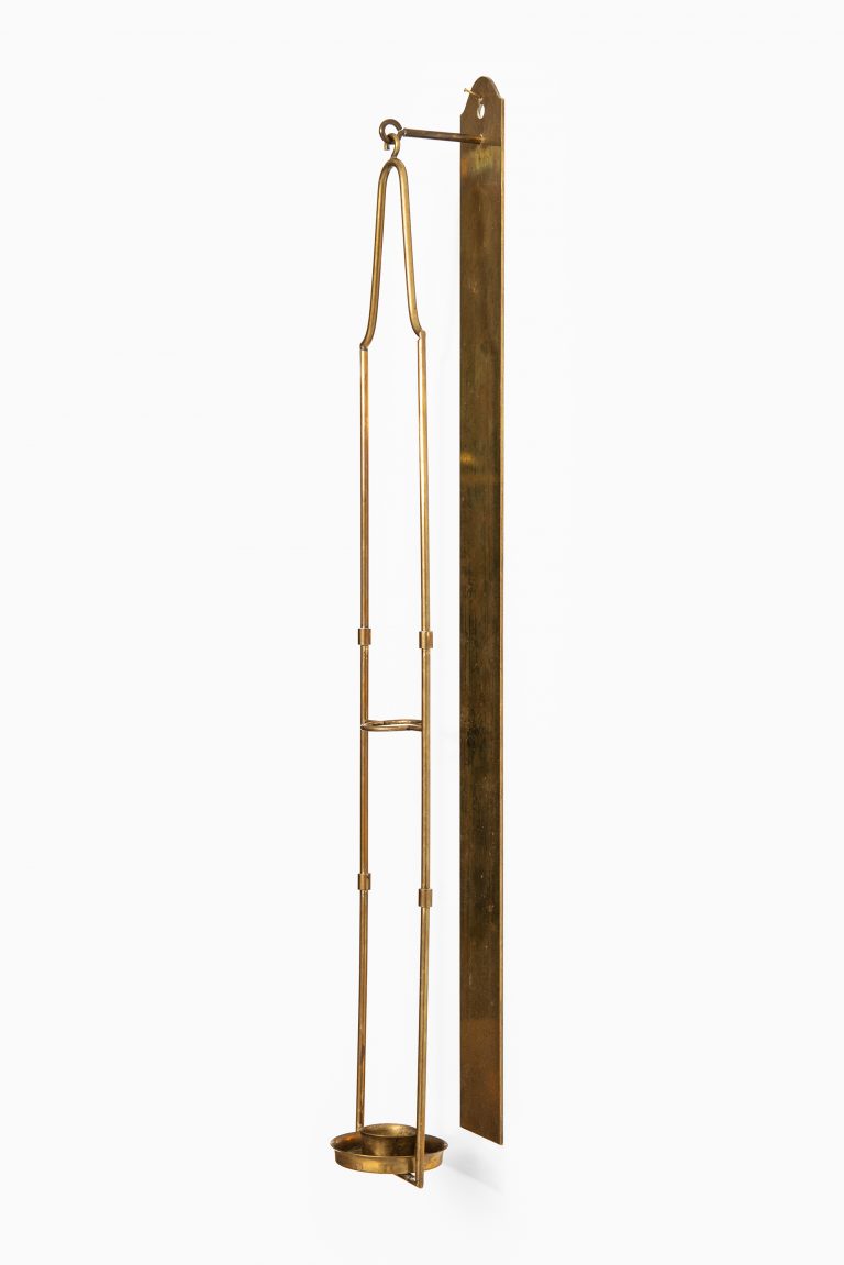 Wall candlestick in brass produced in Sweden at Studio Schalling