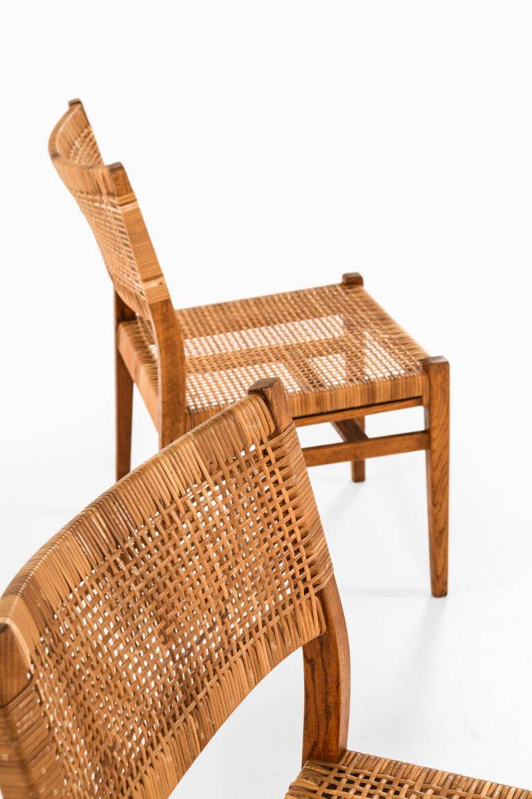 Dining chairs in oak and cane by unknown designer at Studio Schalling