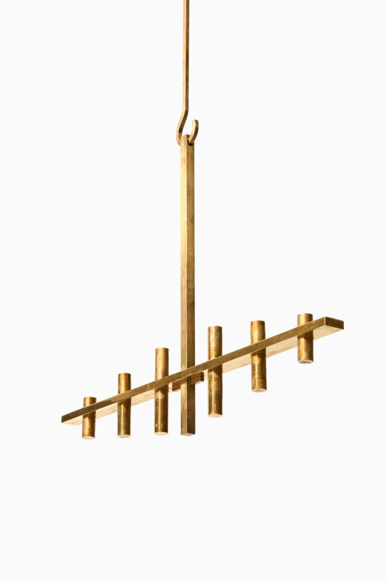Large hanging chandelier in brass at Studio Schalling