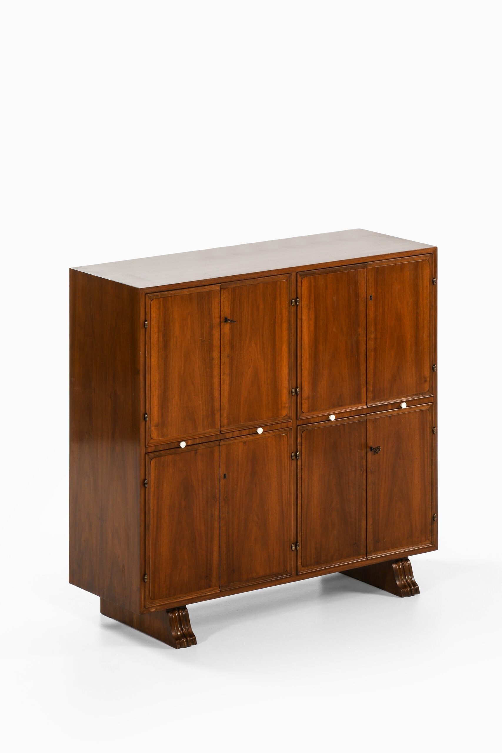 Bar cabinet in walnut and brass at Studio Schalling